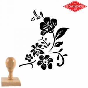 Carimbo de madeira com padrão floral decorativo em preto