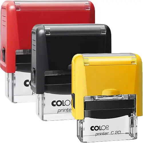 Três carimbos automáticos Colop em vermelho, preto e amarelo, ideais para personalização com texto, imagem ou logótipo.